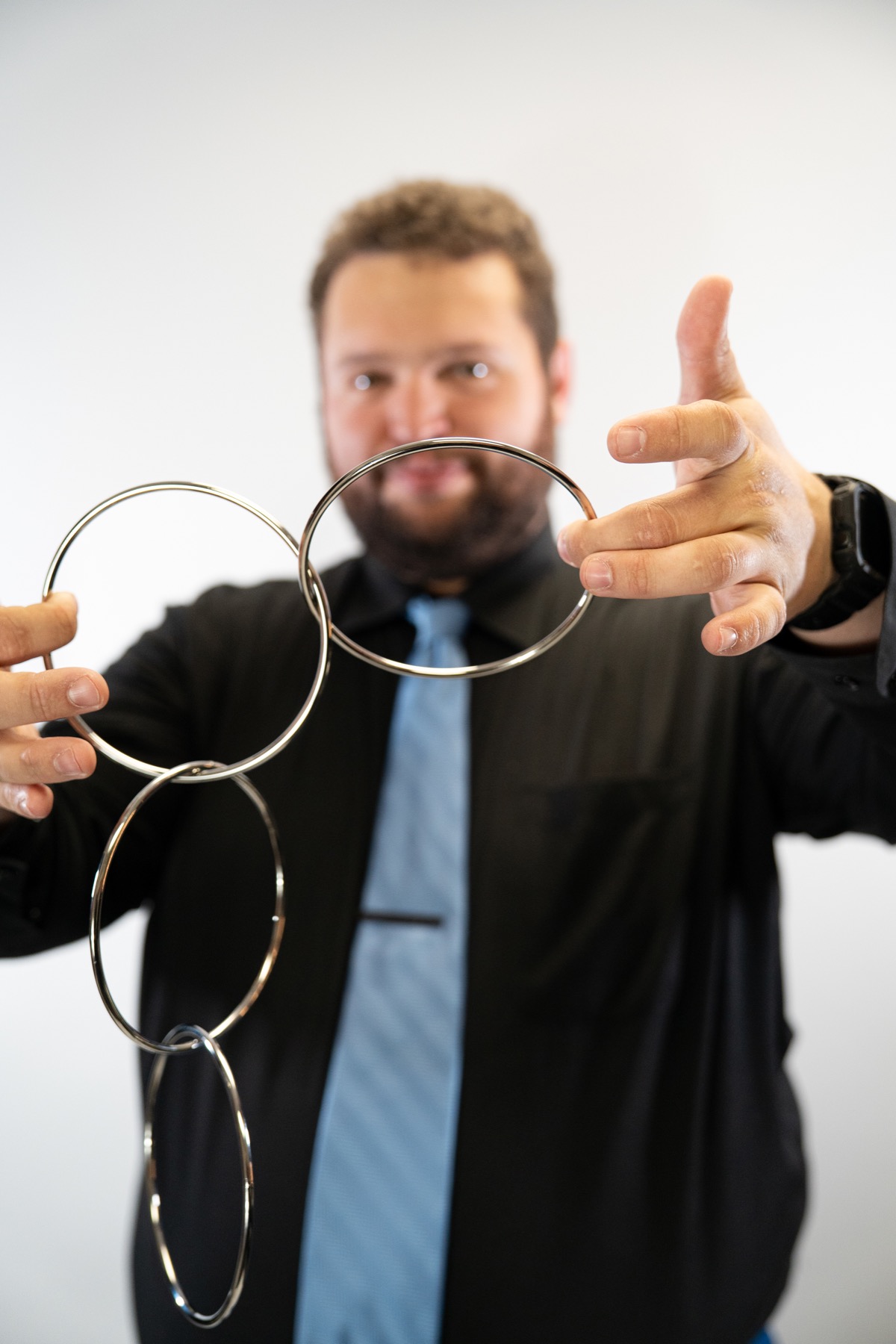 Bryce performing the linking rings illusion